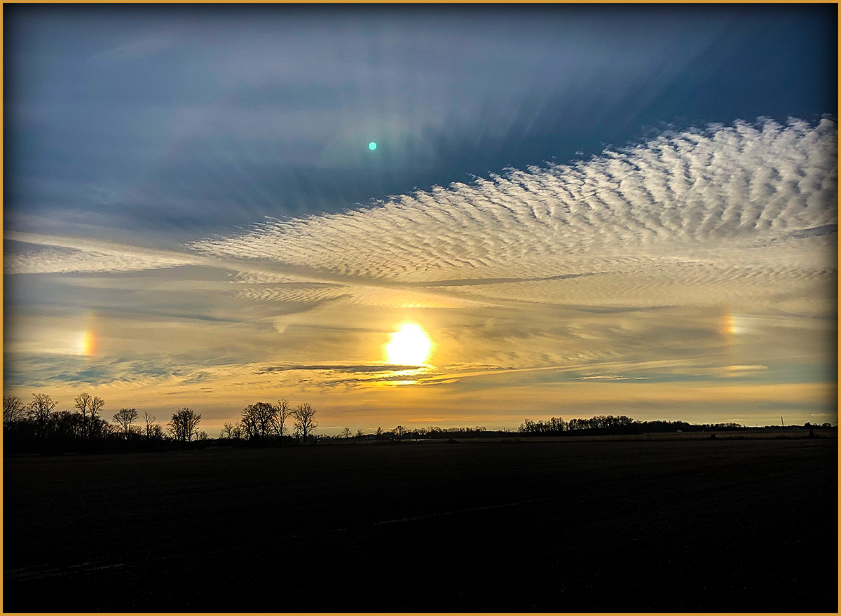 Dual Rainbows At Sunset